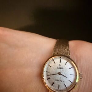 Rado Gold white face Timepiece